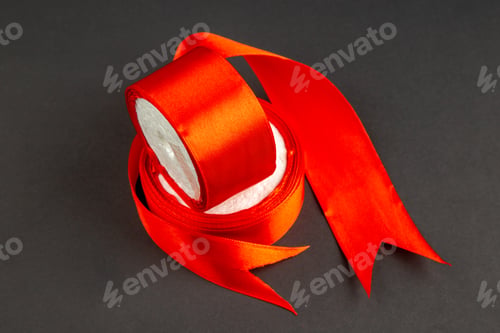 Preview: above view red bow on dark background measure darkness clothes pin sewing color photo sew