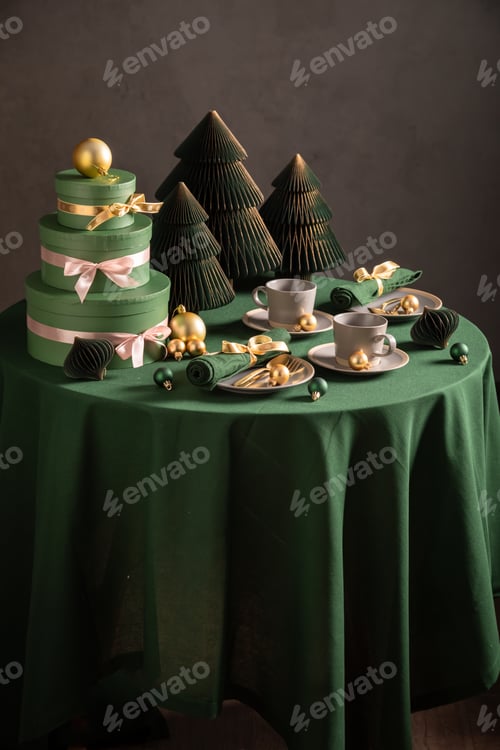 Preview: Beautiful green Christmas tableware for two with tableware and presents.