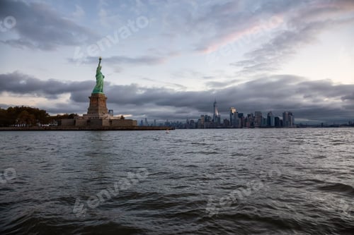 Preview: Statue of Liberty during a vibrant cloudy sunrise