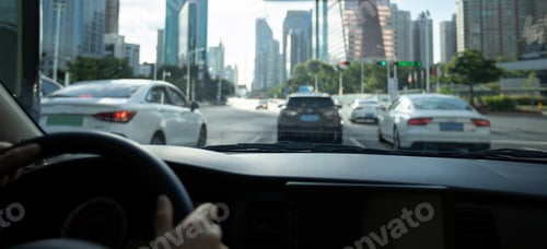 Preview: Driving car in modern city