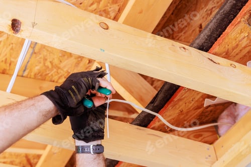 Preview: An electrician mounts the wiring a electrical connect of ceiling light lamp