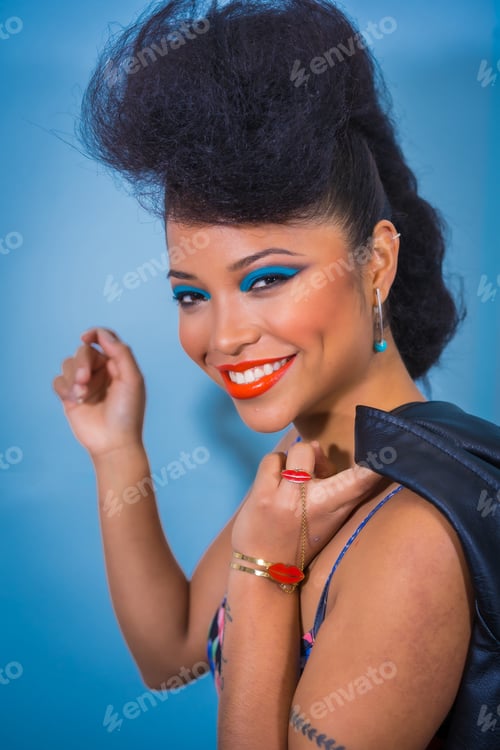Preview: A closeup portrait of a fashion attractive rocker style woman with bright makeup