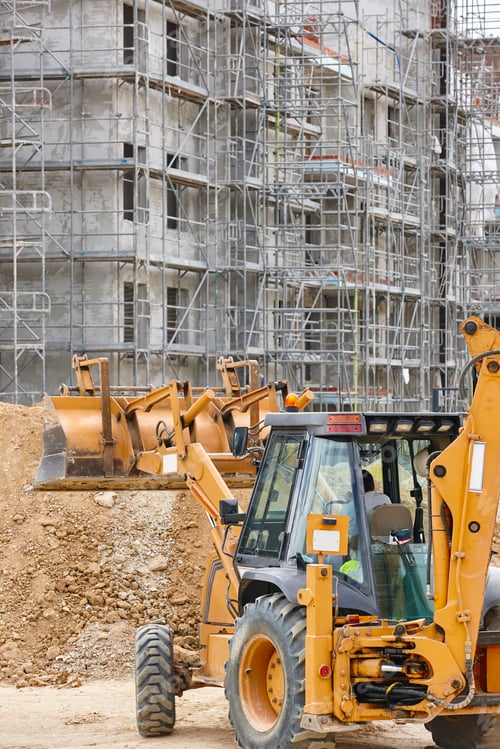 Preview: Excavator on a construction site. Building in progress. Architecture. Vertical