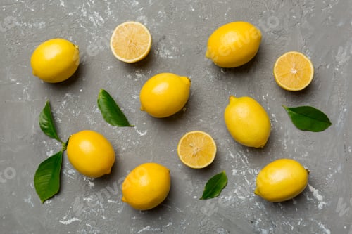 Preview: Many fresh ripe lemons as colored background, top view. Elegant background