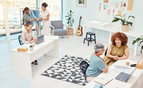 Preview: Designer group, workshop and fashion women with laptop, talking and planning with ideas, creativity