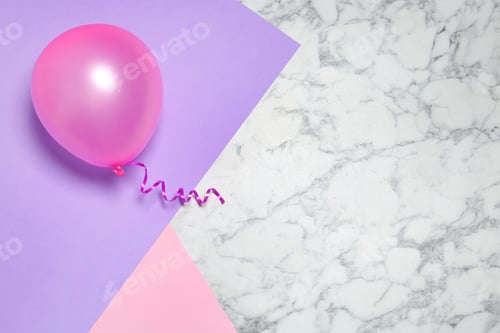 Preview: Bright balloon on colorful background, top view with space for text. Party time