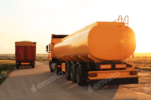 Preview: Modern bright trucks parked on country road