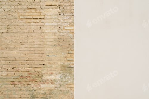Preview: Background of a wall half white and half with bricks, divided into two halves.