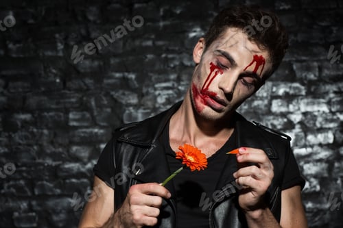 Preview: Bloody vampire in love plucking flower petals