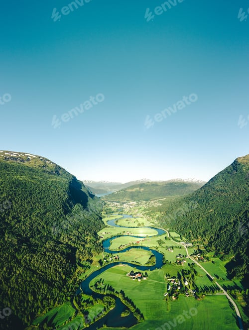 Preview: Mesmerizing shot of beautiful mountains with Stryneelva river in Norway