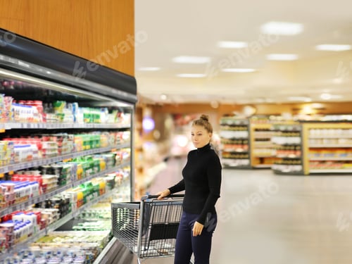 Preview: Woman Choosing A Dairy Products At Supermarket