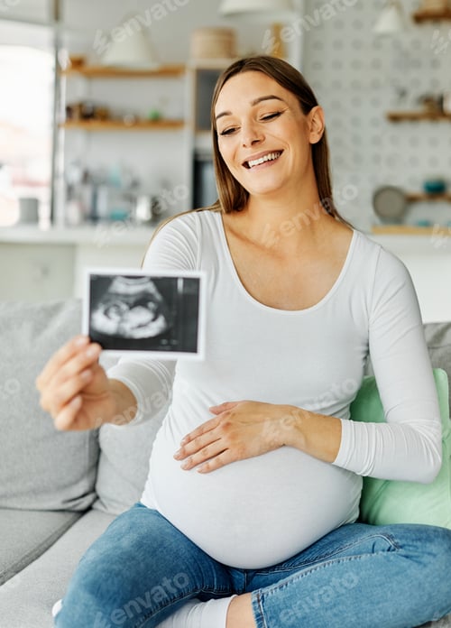 Preview: woman ultrasound pregnant mother holding female pregnancy baby belly scan care maternity photo