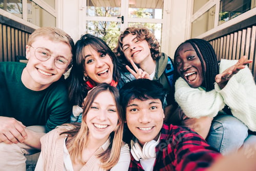 Preview: multi ethnic group of young people taking selfie