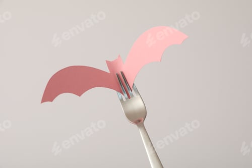 Preview: Table setting for Halloween, a bat on a fork