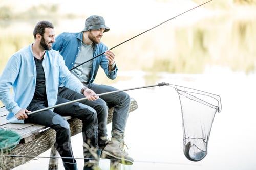 Preview: Men catching fish on the lake