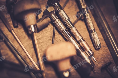 Preview: Different goldsmiths tools on the goldsmith workplace.