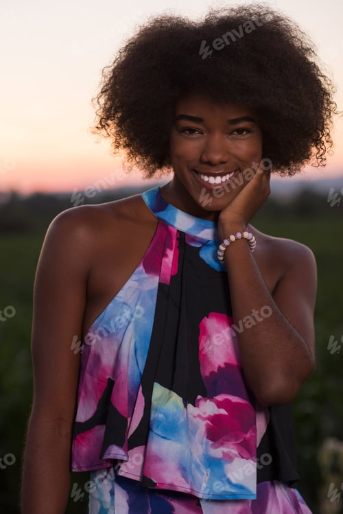 Preview: portrait of a young African-American woman in a summer dress