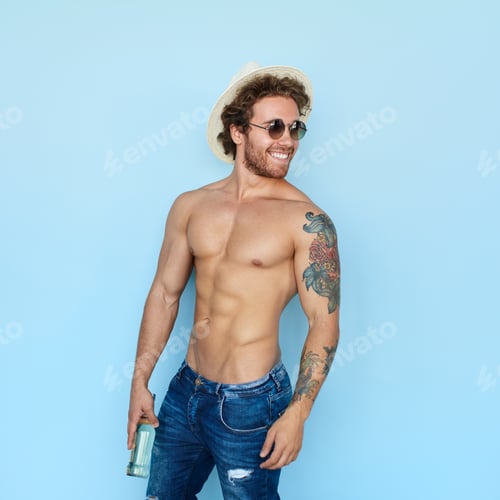 Preview: Content muscular man posing on blue