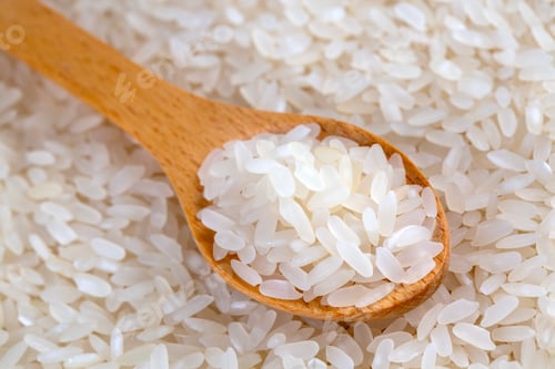 Preview: Raw white rice on a white background