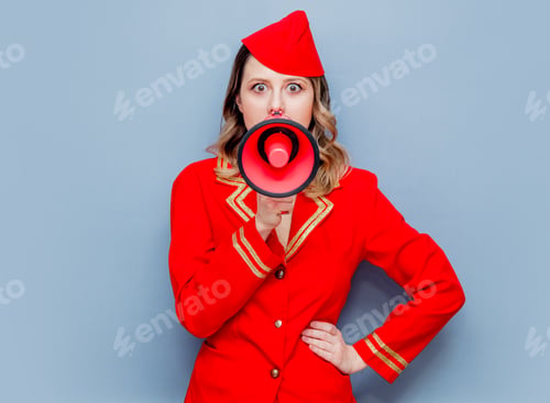 Preview: stewardess wearing in red uniform with megaphone