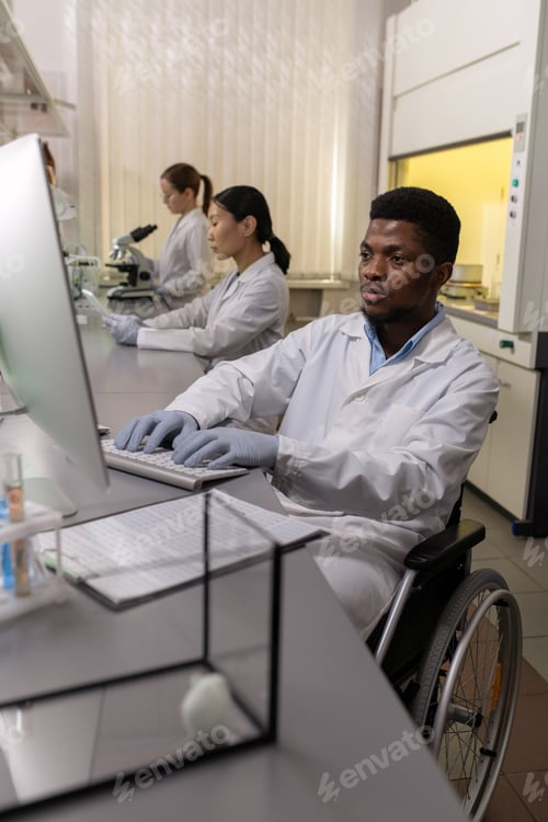 Preview: Scientist working on computer in the lab