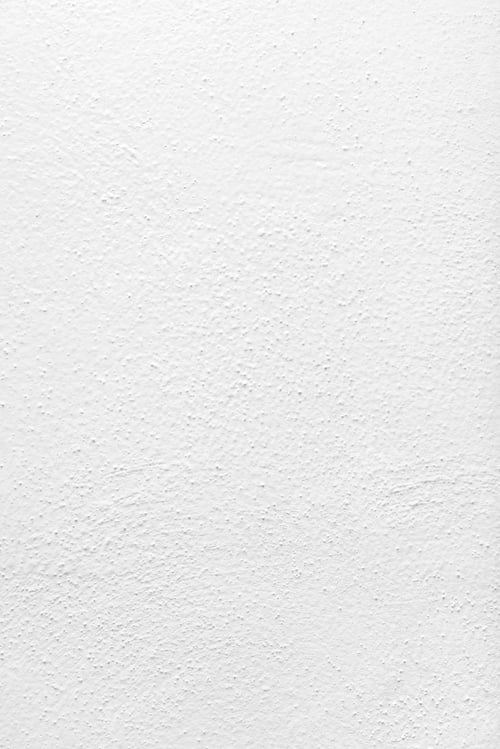 Preview: White concrete wall textured with scratches and cracks