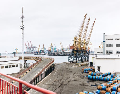 Preview: Sea port with cranes and docks early in the morning