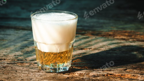 Preview: Pouring fresh beer into a glass for oktoberfest