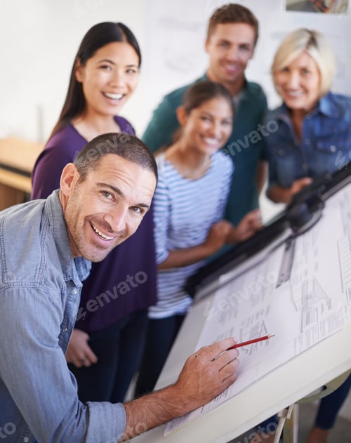 Preview: Guiding the next generation of architects. Cropped shot of a group of architects discussing plans.