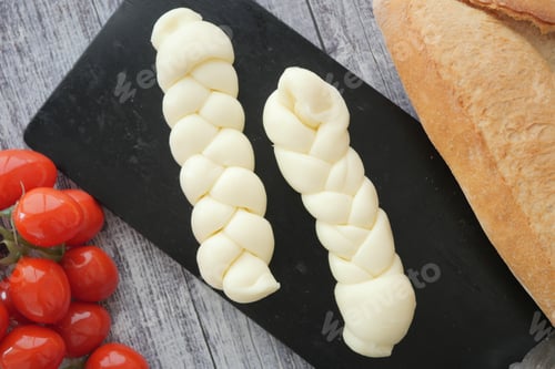 Braided Cheese with Red Tomatoes and Crusty Bread