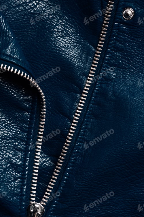 Preview: top view of dark blue leather textile with zipper as background