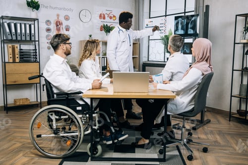 Preview: Medical workers discussing gene modification during meeting