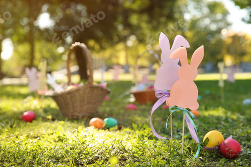 Preview: Easter decor and eggs on grass in park. Space for text