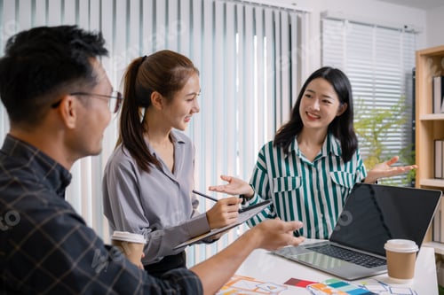 Preview: UX/UI designers collaborating during a creative workshop