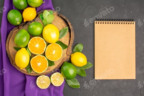 Preview: top view fresh sour lemons on the dark background citrus lime tree fruit