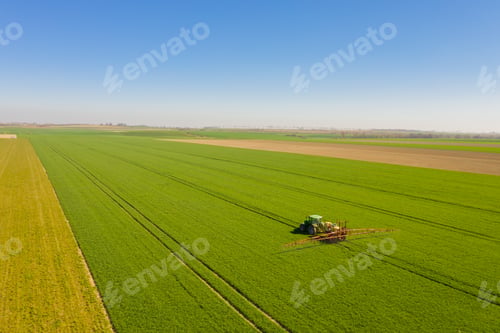 Preview: Agriculture Tractor Working in Field