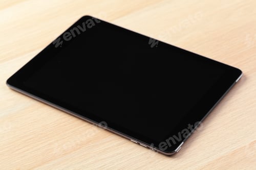 Preview: digital tablet on wooden table