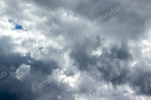 Preview: Dramatic sky with gray white blue clouds. Overcast and cloudy to rain
