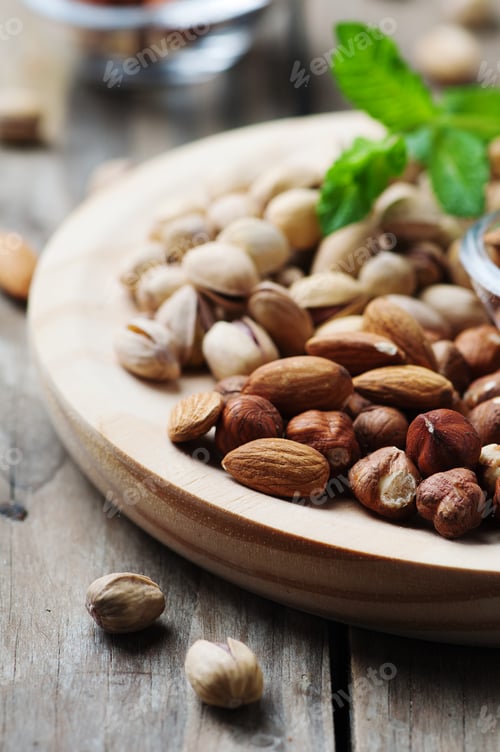 Preview: Mix of nuts on the wooden table