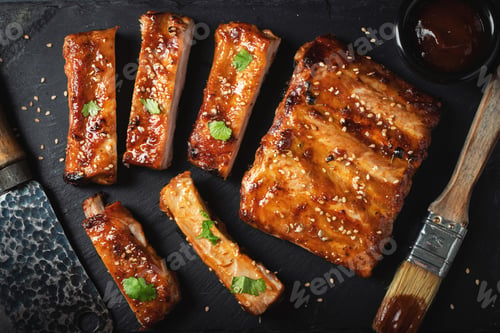 Preview: Barbecue pork spare ribs with hot honey chili marinade on black background