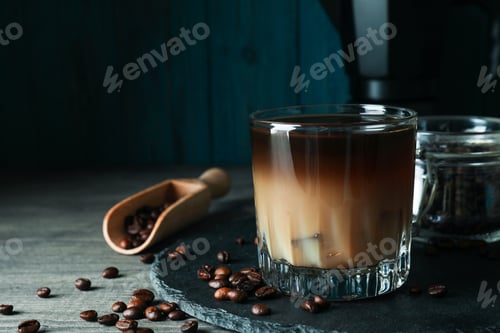 Preview: Concept of cold drink with ice coffee, close up