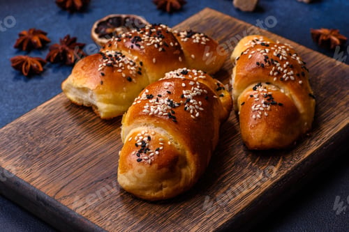 Preview: Delicious homemade pastries with apricot jam sprinkled with sesame seeds