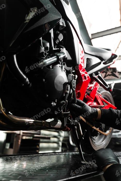 Preview: Motorcycle Repair with Tool in Auto Repair Shop