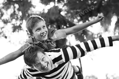 Preview: Superhero boy flying on the back of his dad