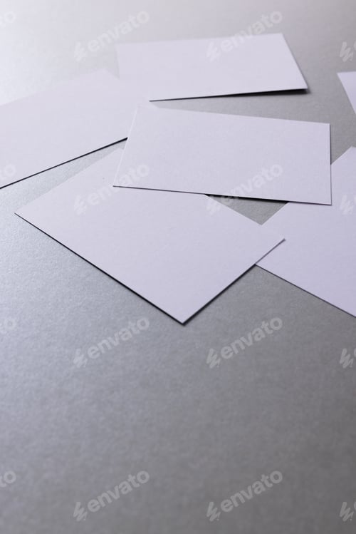 Preview: White business cards with copy space on grey background