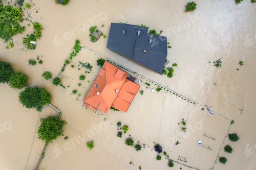 Preview: Aerial view of flooded houses with dirty water of Dnister river in Halych town, western Ukraine