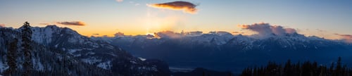 Preview: Dramatic Canadian Mountain Landscape View during a sunny and cloudy winter sunset