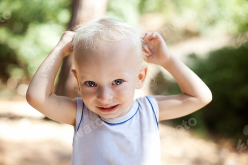 Preview: smiling little boy in the park