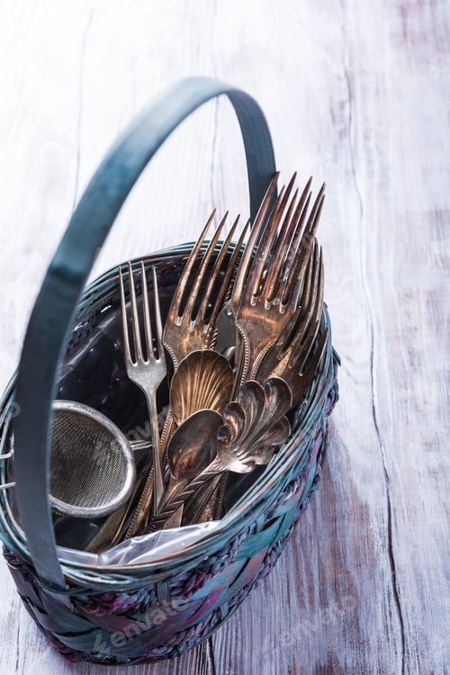 Preview: Vintage cutlery in old blue wicker basket