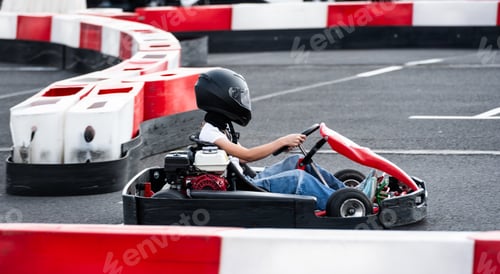 Preview: Little Girl Rides Go-Kart On Race Track